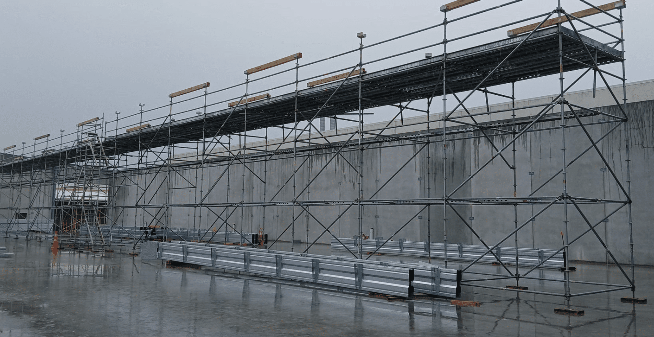 Jase Scaffolding homepage showing scaffolding installed on a Manawatū building project